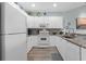 Modern kitchen with white cabinets, granite, and stainless steel appliances at 1009 World Tour Blvd. # 304, Myrtle Beach, SC 29579