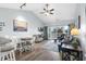 Spacious living room with hardwood floors, comfortable seating, and access to a balcony at 1009 World Tour Blvd. # 304, Myrtle Beach, SC 29579