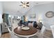 Bright living room with water views, dining area, and comfy seating at 1009 World Tour Blvd. # 304, Myrtle Beach, SC 29579