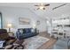 Spacious living area with hardwood floors, comfortable seating, and kitchen views at 1009 World Tour Blvd. # 304, Myrtle Beach, SC 29579