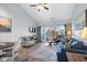 Spacious living room with hardwood floors, comfortable seating, and access to a balcony at 1009 World Tour Blvd. # 304, Myrtle Beach, SC 29579