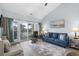 Spacious living room with hardwood floors, comfortable seating, and access to a balcony at 1009 World Tour Blvd. # 304, Myrtle Beach, SC 29579