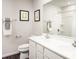 Bathroom with double vanity, shower, and dark hardwood floors at 1075 Oak Meadow Dr., Conway, SC 29526