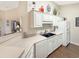 Bright kitchen with sleek countertops, white cabinetry, modern appliances, and plenty of space at 1109 Peace Pipe Ln. # 201, Myrtle Beach, SC 29579