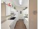 Bright kitchen featuring all-white cabinetry, updated appliances, and a functional layout for easy cooking at 1109 Peace Pipe Ln. # 201, Myrtle Beach, SC 29579