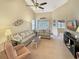 Inviting living room featuring vaulted ceilings, comfortable seating, and natural light at 1109 Peace Pipe Ln. # 201, Myrtle Beach, SC 29579