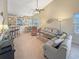Open living space showcasing vaulted ceilings, bar seating, and comfortable furniture at 1109 Peace Pipe Ln. # 201, Myrtle Beach, SC 29579