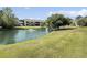 Scenic pond view from the manicured grounds of this condominium community at 1109 Peace Pipe Ln. # 201, Myrtle Beach, SC 29579