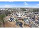 Aerial view of the home in a neighborhood with mature trees; includes a circular driveway at 112 Staton Ln., Longs, SC 29568