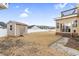 View of backyard featuring a storage shed, patio, and exterior access to an upper-level balcony at 112 Staton Ln., Longs, SC 29568