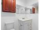 Bathroom with white vanity, tile floors, and framed mirror at 112 Staton Ln., Longs, SC 29568