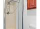 Shower in bathroom with enclosed shower and storage space at 112 Staton Ln., Longs, SC 29568