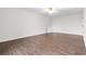 Spacious bedroom with ceiling fan and wood-look flooring at 112 Staton Ln., Longs, SC 29568