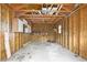 Unfinished garage with peg board and shelving ready for customization at 112 Staton Ln., Longs, SC 29568