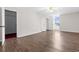 Main bedroom with ceiling fan, closet, and wood-look floors at 112 Staton Ln., Longs, SC 29568