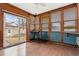 Sun room with natural light, wood trim, wood floors, and access to backyard at 112 Staton Ln., Longs, SC 29568