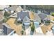 An aerial view shows homes near a pond, with well-maintained lawns and a cul-de-sac at 1209 Peyton Ct., Myrtle Beach, SC 29588