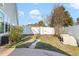 Back yard with a concrete patio and privacy fence at 1209 Peyton Ct., Myrtle Beach, SC 29588