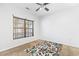 Spacious bedroom with a large window and patterned rug at 1209 Peyton Ct., Myrtle Beach, SC 29588