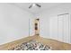 Bedroom with neutral carpet, white walls, a ceiling fan, and view of the hallway at 1209 Peyton Ct., Myrtle Beach, SC 29588
