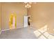 Spacious bedroom with vaulted ceiling, neutral walls, and doorway leading to another room at 1209 Peyton Ct., Myrtle Beach, SC 29588