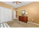 Comfortable bedroom with double closets, dresser, and doorway leading to another room at 1209 Peyton Ct., Myrtle Beach, SC 29588