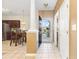 Inviting foyer with neutral walls, tile floors, and view into the kitchen and adjacent hallway at 1209 Peyton Ct., Myrtle Beach, SC 29588