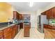 Well-lit kitchen with stainless steel appliances, granite countertops, and tiled backsplash at 1209 Peyton Ct., Myrtle Beach, SC 29588