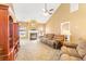 Spacious living room with fireplace, plush carpeting, ceiling fan, and ample seating at 1209 Peyton Ct., Myrtle Beach, SC 29588