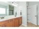Double vanity bathroom with a large mirror and additional storage at 1325 Cascarilla Ct., Myrtle Beach, SC 29579