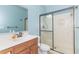 Clean bathroom with single vanity, large shower, and updated fixtures at 1325 Cascarilla Ct., Myrtle Beach, SC 29579