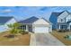 Attractive one-story house with a two-car garage and well-manicured lawn at 1325 Cascarilla Ct., Myrtle Beach, SC 29579