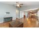 Open living area with hardwood floors and a fireplace at 1325 Cascarilla Ct., Myrtle Beach, SC 29579