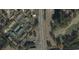 Aerial view of property showing community layout, parking, proximity to a highway, and adjacent golf course at 1432 Highway 544, Conway, SC 29526