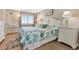 Bedroom with a queen-size bed and plenty of light at 2001 S Ocean Blvd. # 1401, Myrtle Beach, SC 29577