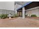 Building entrance with landscaping and fountain at 2001 S Ocean Blvd. # 1401, Myrtle Beach, SC 29577