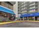 Building entrance with access to shops and amenities at 2001 S Ocean Blvd. # 1401, Myrtle Beach, SC 29577