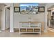 Beach-themed entryway with TV and storage at 2001 S Ocean Blvd. # 1401, Myrtle Beach, SC 29577