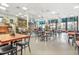 Restaurant with tables, chairs, and a full bar at 2001 S Ocean Blvd. # 1401, Myrtle Beach, SC 29577