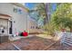 Small, fenced backyard with patio and partial view of neighboring house at 207 Townes Ct., Myrtle Beach, SC 29588