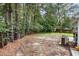 Large backyard with some trees and some exposed dirt at 207 Townes Ct., Myrtle Beach, SC 29588
