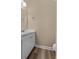 Cozy powder room with a clean, white vanity and stylish flooring at 207 Townes Ct., Myrtle Beach, SC 29588