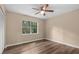Bedroom with hardwood floors, a window, and a ceiling fan at 207 Townes Ct., Myrtle Beach, SC 29588
