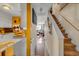 Bright entryway with stairs leading upstairs and views into living and kitchen areas at 207 Townes Ct., Myrtle Beach, SC 29588