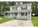 Charming two-story home with a welcoming front porch and well-maintained lawn at 207 Townes Ct., Myrtle Beach, SC 29588