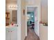 Hallway providing access to a bathroom on the left and a bedroom straight ahead at 207 Townes Ct., Myrtle Beach, SC 29588