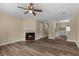 Spacious living room features a cozy fireplace and modern ceiling fan at 207 Townes Ct., Myrtle Beach, SC 29588