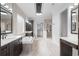 Luxurious bathroom with double vanities, soaking tub, and walk-in shower at 215 82Nd Ave. N, Myrtle Beach, SC 29572