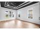 Bright bonus room with hardwood floors and ceiling fan at 215 82Nd Ave. N, Myrtle Beach, SC 29572
