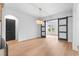 Spacious dining room with hardwood floors and sliding barn doors at 215 82Nd Ave. N, Myrtle Beach, SC 29572